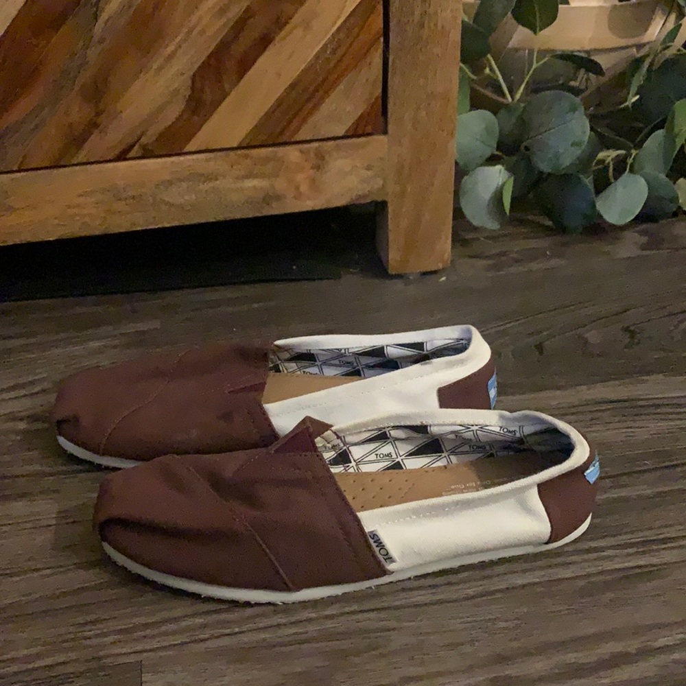 Tom’s maroon and white, worn once